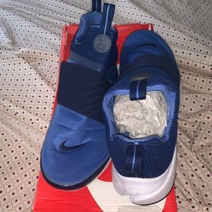 Blue and white nike prestos
